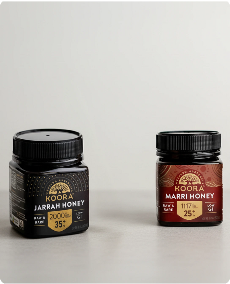 Two jars of Koora honey on a light gray background